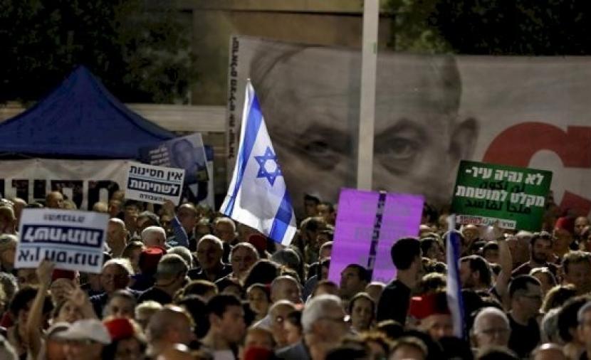 إسرائيل: أكثر من 20 ألفاً يتظاهرون ضد نتنياهو مُطالبن إياهُ بالتنحّي 112112