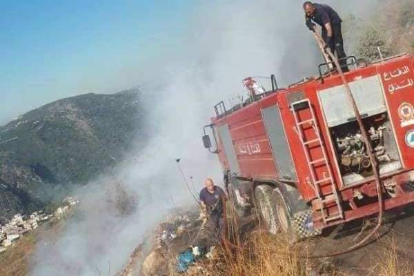 إخماد حريق أعشاب وأشجار مثمرة وحرجية في الفرديس 112112