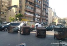 قطع طريق الكولا بمستوعبات للنفايات 112112