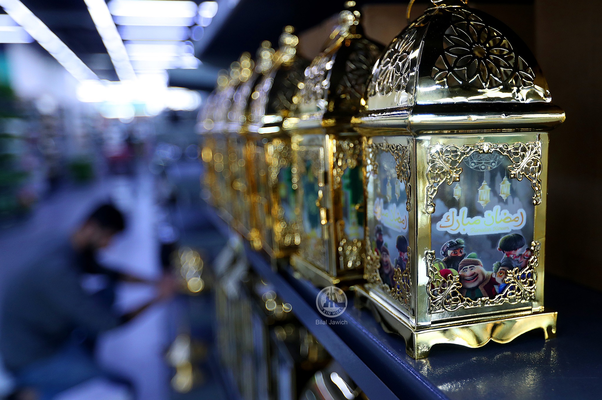 May be an image of 1 person, wind chime and text that says '60 امضان مبارک امضانمبارك Bilal'