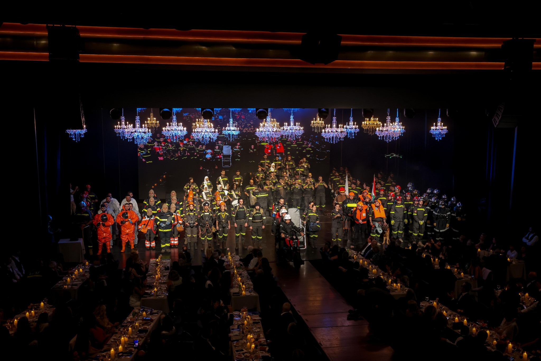 May be an image of lighting and crowd